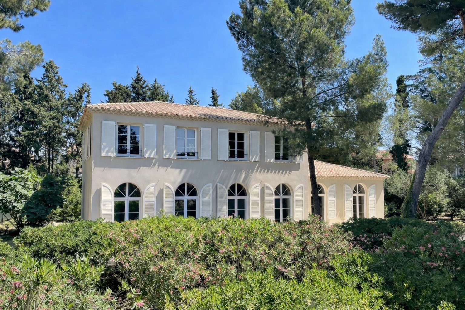 La Bergerie du Parc — arched windows, tucked beneath the pines